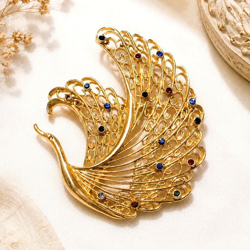 Vintage Lacy Gold Tone Rhinestone Accented Flying Bird Brooch